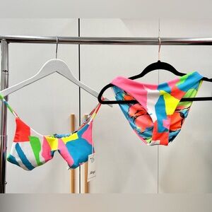 Medium Maaji women’s reversible bikini top and bottom.